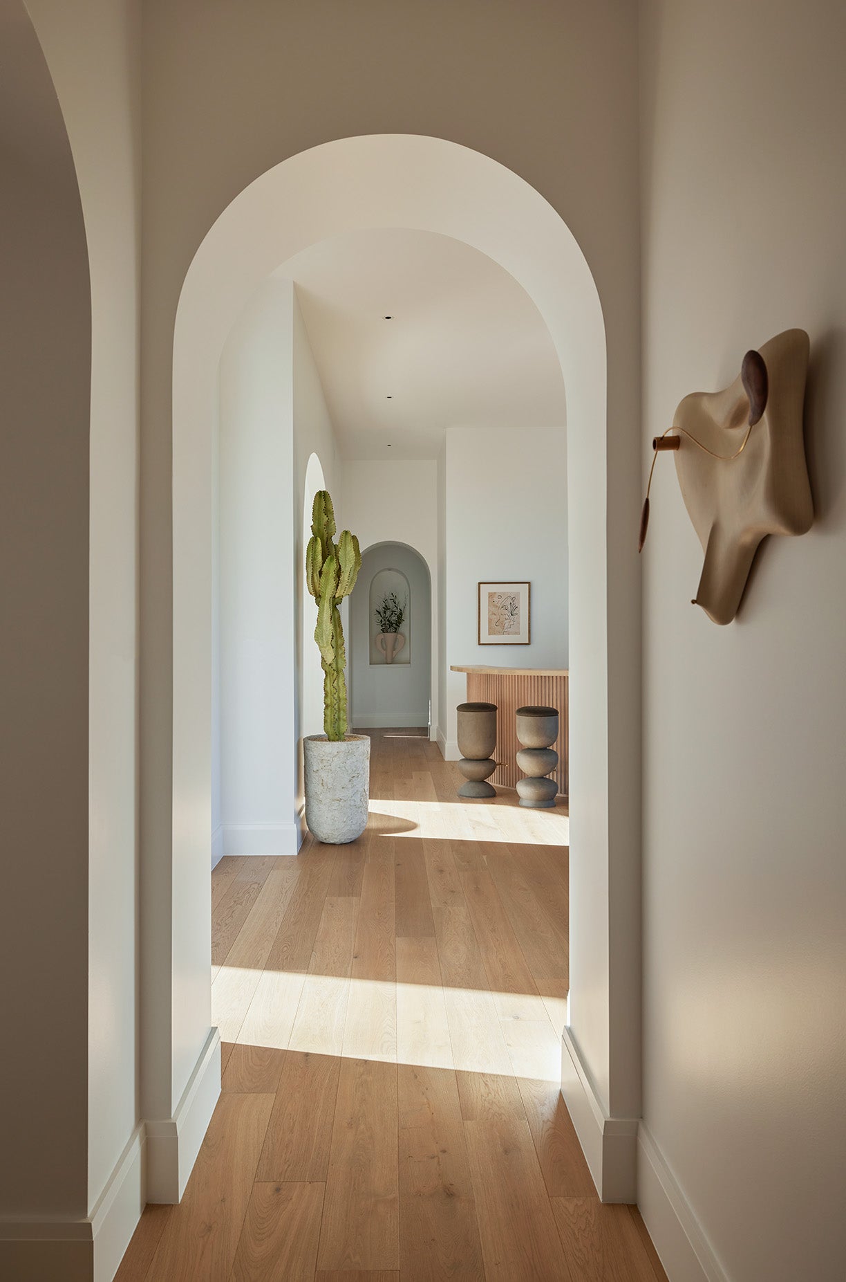 an interior view with midcentury modern furniture and northern wide wood planks on the floor