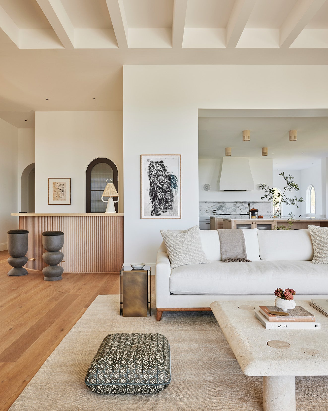 an interior view with midcentury modern furniture and northern wide wood planks on the floor