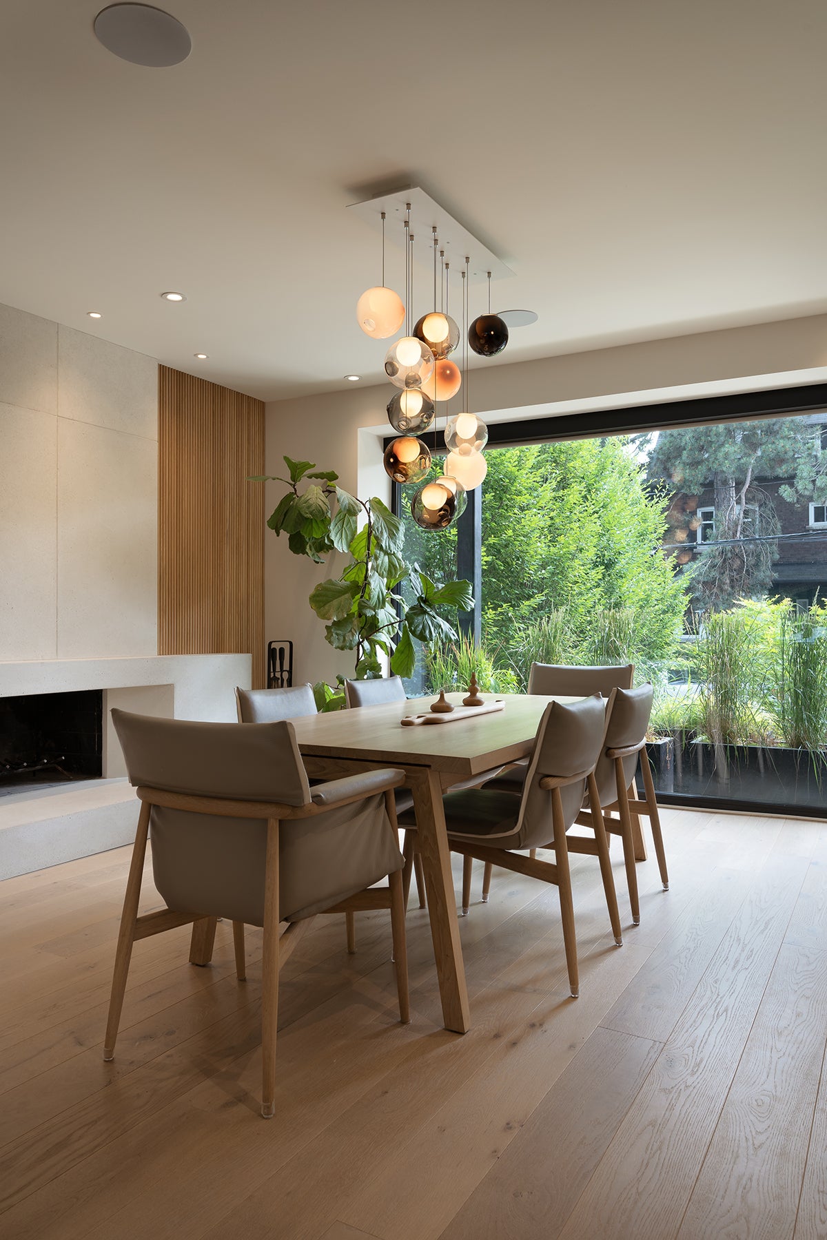 an interior view with midcentury modern furniture and northern wide wood planks on the floor