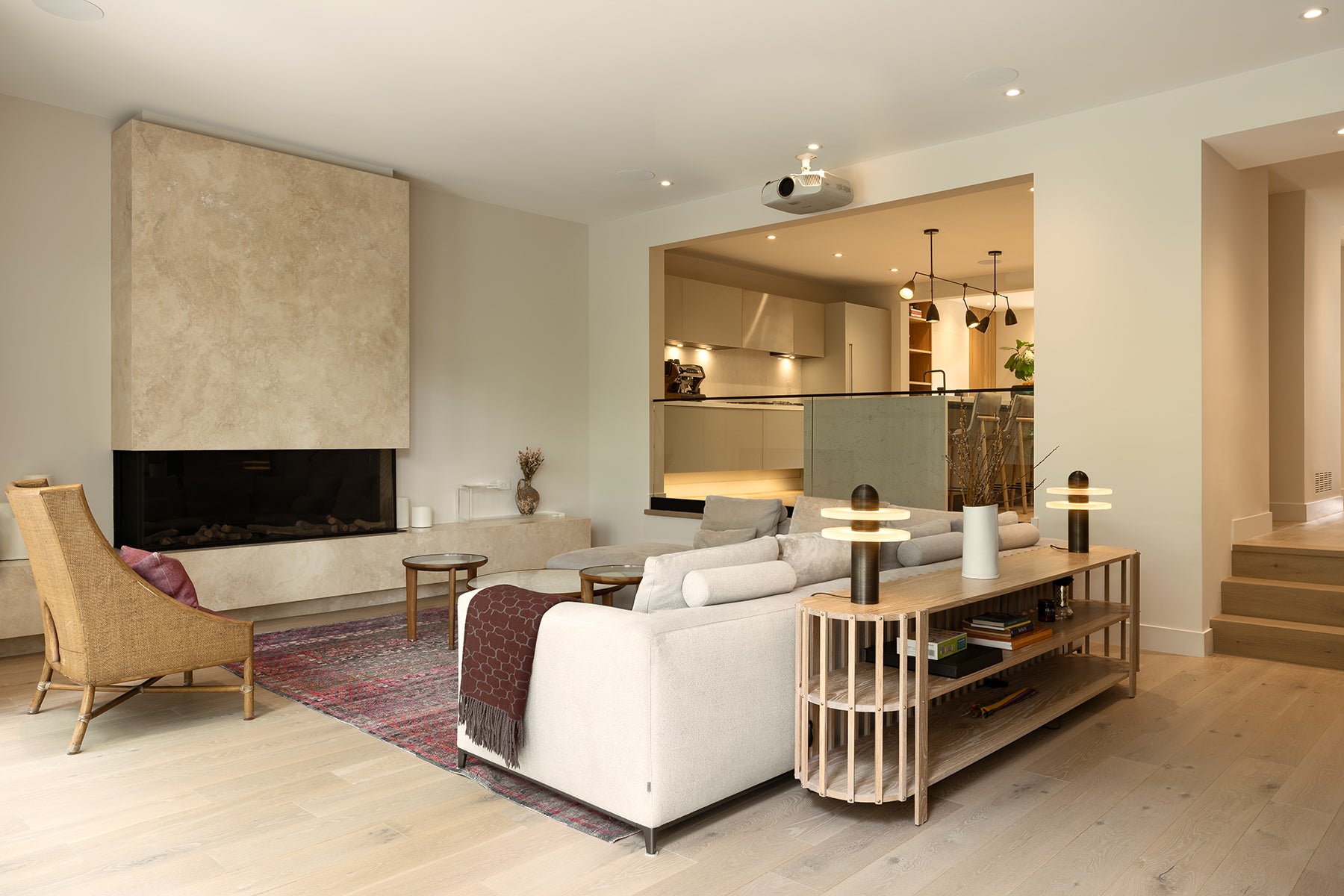 an interior view with midcentury modern furniture and northern wide wood planks on the floor