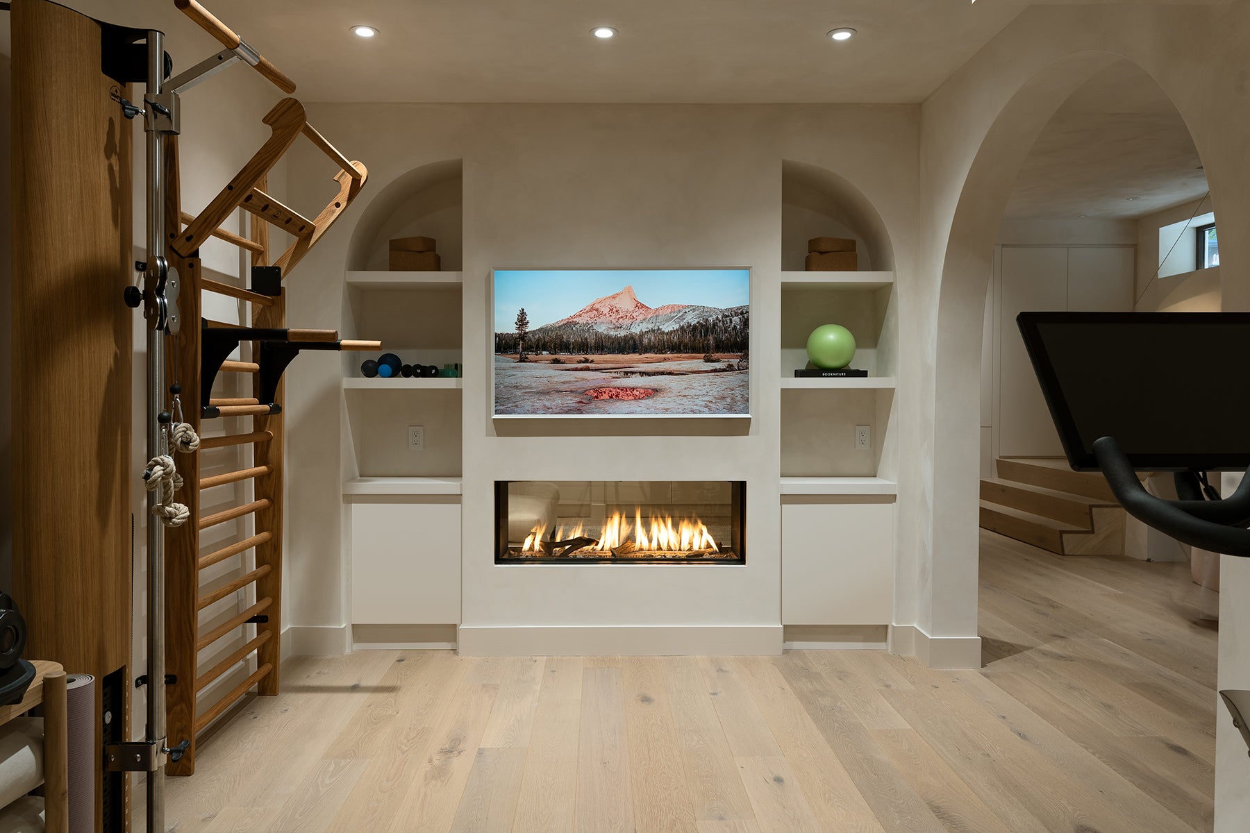 an interior view with midcentury modern furniture and northern wide wood planks on the floor