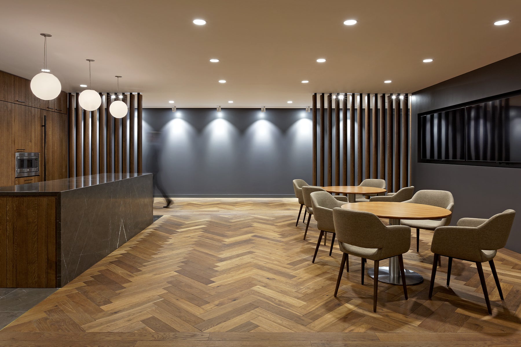 an interior view with midcentury modern furniture and northern wide wood planks on the floor