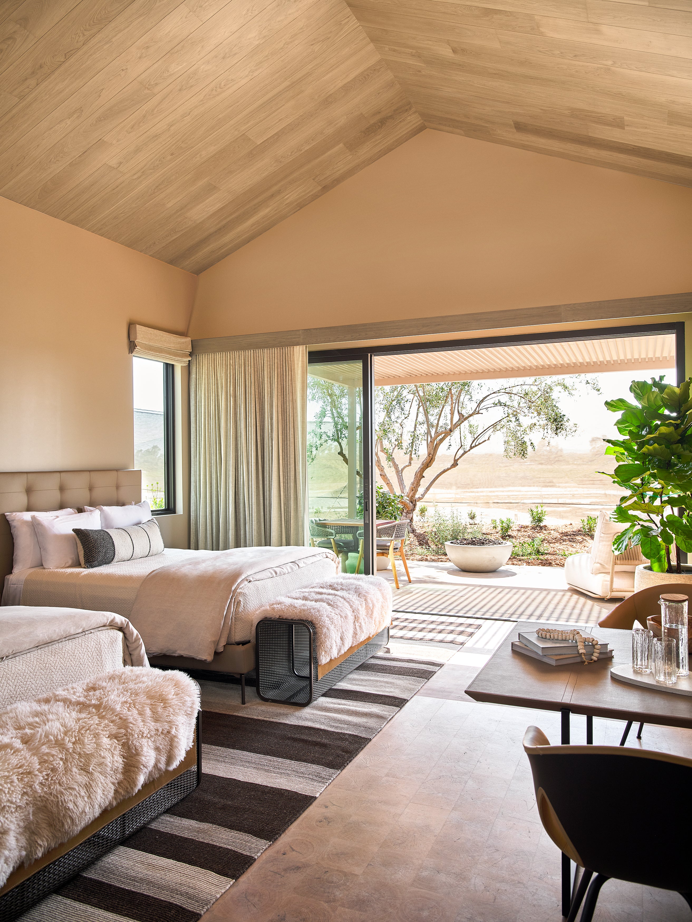 an interior view with midcentury modern furniture and northern wide wood planks on the floor