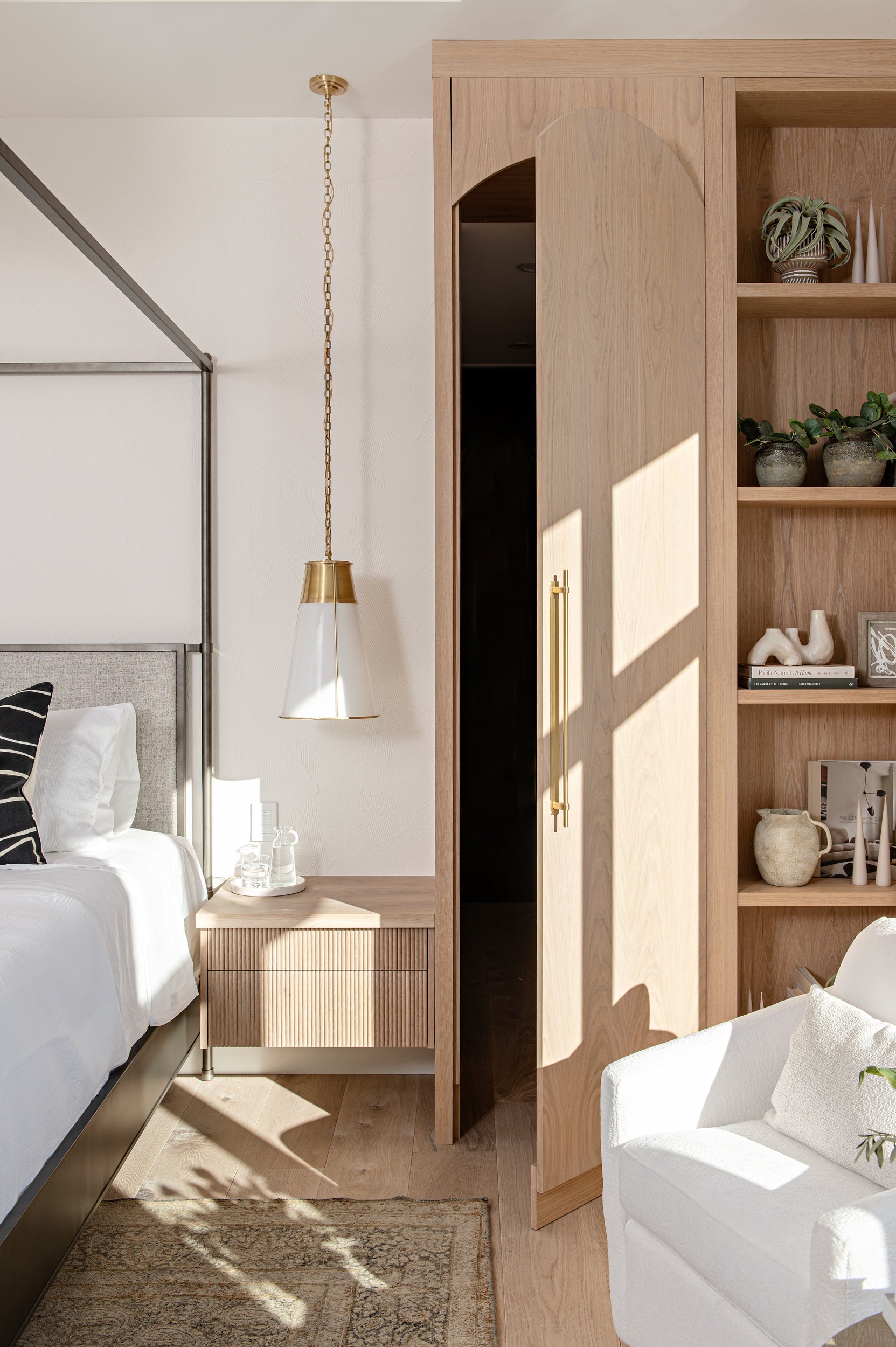 an interior view with midcentury modern furniture and northern wide wood planks on the floor