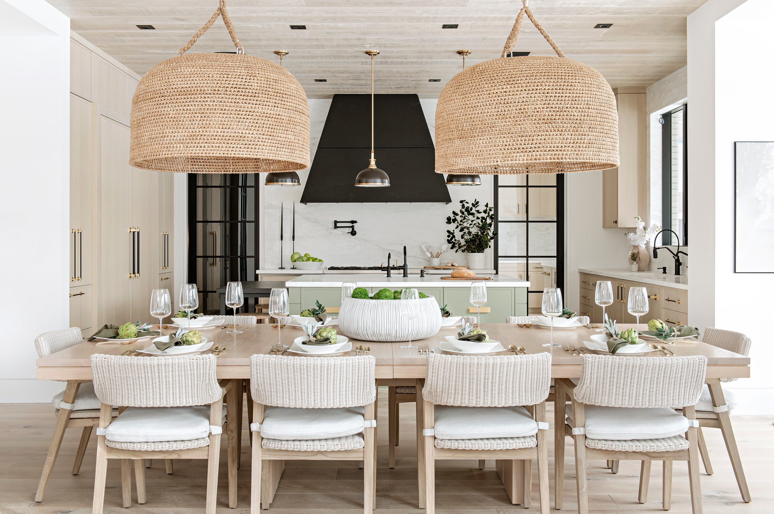 an interior view with midcentury modern furniture and northern wide wood planks on the floor